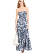 Perfect for a breezy spring look, this MICHAEL Michael Kors maxi dress features simple styling in a standout print!