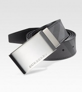 Sartorial sophistication in the coveted check design with an engraved logo buckle. About 1½ wide PVC/leather/brass Made in Italy 