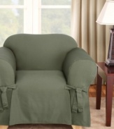 Featuring a narrow pinstripe weave in solid hues, Sure Fit's Logan chair slipcover gives your furniture a bold new look. Subtle textured detail and decorative ties add to this slipcover's classic appeal. One piece.