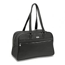 The new black - a classic combination of black glazed cotton twill and black Napa leather, the Metropolitan collection is a sophisticated option for an urban look in luggage. Its construction is lightweight, the materials high performance and shiny nickel zipper is the perfect signature detail. The Mobile Traveler Spinners and new designs address today's traveler's needs for carry-on luggage.