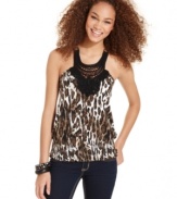 Savage beauty: Belle Du Jour designs this animal-print blouson top with a crochet-knit neckline of intricate design!