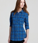 Layered with rebellious attitude, this Burberry Brit shirt remixes the classic check print with a cool new color palette. Slip a leather jacket over the style for real modern edge.