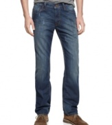 Slim through the leg and relaxed towards the ankle, these distressed Bleecker-fit jeans from DKNY Jeans bring a modern look that works hard for your wardrobe.