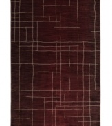 A saturated hue plays host to a contemporary, linear pattern, creating a striking statement in any space. Thick and resilient underfoot, this plush piece is woven from 2-ply nylon pile, ensuring easy care and long-lasting wear.