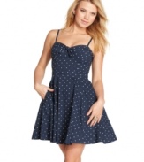 Sweetly alluring with its back cutout detail and a bustier-style bodice, this polka dot frock puts the a-line in adorable! From Jessica Simpson.