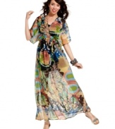 Let your inner gypsy out! This fabulously florid sheer maxi dress from American Rag has flowing sleeves and a gorgeous harmony of patterns for a free-spirited look!