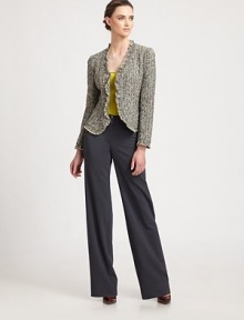 Textural bouclé tweed, tailored in a feminine silhouette accented with raw, slightly ruffled edges.V neckline Open frontSlightly puffed long sleevesRaw, ruffled edgesAbout 21 from shoulder to hem46% acrylic/26% cotton/12% polyamide/9% polyester/7% viscoseDry cleanMade in Italy of imported fabricModel shown is 5'11(180cm)wearing US size 4. Textural bouclé tweed, tailored in a feminine silhouette accented with raw, slightly ruffled edges.V neckline Open frontSlightly puffed long sleevesRaw, ruffled edgesAbout 21 from shoulder to hem46% acrylic/26% cotton/12% polyamide/9% polyester/7% viscoseDry cleanMade in Italy of imported fabricModel shown is 5'11(180cm)wearing US size 4.