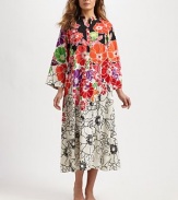 A fierce floral print defines this Asian-inspired, silky-smooth silhouette. JewelneckHalfway zip frontLong sleevesFront slash pocketsAbout 52 from shoulder to hemPolyesterMachine washImported