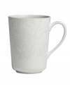 The elegant Bliss mug from Monique Lhuillier for Royal Doulton is made for every day, shaped for modern decor and draped with romantic florals in a soft, muted palette.