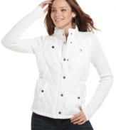 Fitted for an active lifestyle, JJ Basics' jacket has a quilted bodice with knit sleeves. Pair it over your favorite fall outfits for a sporty look that never goes out of style.