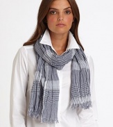 A classic plaid design made from woven cotton. Fringe trim72 X 28CottonDry cleanImported