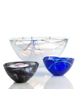 Electric strokes of aquamarine are expertly suspended in this brilliant glass bowl. A one-of-a-kind, handmade creation that adds pop to any room. Designed by Anna Ehrner for Kosta Boda.