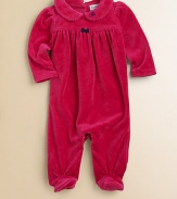 A beautiful long-sleeved footed coverall in plush velour is highlighted with pretty puff sleeves and embroidery.Peter Pan collarLong sleevesBack buttonsGathered empire waistConcealed bottom snaps80% cotton/20% polyesterMachine washImported Please note: Number of snaps/buttons may vary depending on size ordered. 