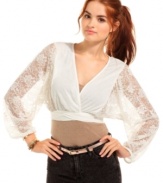 Bring feminine spirit to your outfit! Lacy sleeves balloon with soft drama on Planet Gold's ethereal crop top.