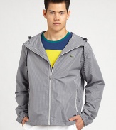 Top of your casual ensemble the right way with this check print, hooded anorak, lightweight and versatile enough to take you from this season to the next.Zip-frontAttached drawstring hoodSide slash pocketsAbout 28 from shoulder to hemPolyamideMachine washImported