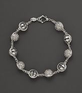Inspired by Zen philosophy, this intricately detailed sterling silver bracelet from Paul Morelli softly jingles with meditation bells.