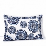 India's biggest city inspires this vibrant sham from John Robshaw. Small and large medallions spin around abstracted, stylized poppies in indigo and phthalo blue to represent the people, cars and trucks on the streets of Mumbai swerving around each other with nearly choreographed grace.