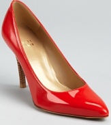 In slick patent leather, these Stuart Weitzman pumps breathe color into practicality.