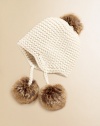 Crafted in a solid classic knit, our vintage-inspired earflap hat is adorned with stylish faux fur trim for a timeless look.Knit crownEarflaps with pom-pom tassels tie beneath the chinWool/CashmereDry cleanImported