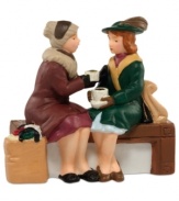 Two dear friends catch up and warm up with a hot cup of joe outside Atwater's Coffee House. A familiar sight in the city throughout the holiday season, from Department 56.