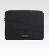 Protect your laptop in style with this lightly padded neoprene case finished with debossed logo detail and a signature patch.Zip closureNeoprene15¼W x 11½H x 1DImported