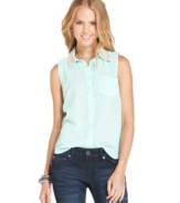 A beaded collar brings urban-luxe style to this sleeveless button-down top -- the perfect addition to your fashion-forward day look! From Ali & Kris.
