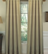 The Soho Silk Stripe window panel is all about style with subtle striping on lustrous silk. What's more, the panel features a poly-cotton lining and 100% cotton flannel interlining to provide additional insulating properties to your window, helping keep cold air out in the winter and hot air out during the summer, as well as help reduce light penetration. (Clearance)