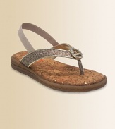 A sparkle thong strap on a cork-lined footbed, delightfully adorned with a rhinestone signature medallion.Sparkle fabric upperRhinestone medallionMetallic faux leather pipingBack elastic strap for easy fitPadded insoleComposite rubber soleCork footbedImported