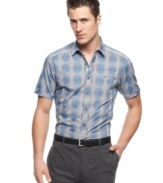 Hit your weekend stride at work on Friday with this versatile short-sleeved plaid shirt from INC International Concepts.