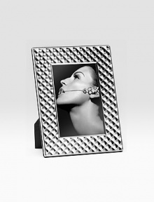 This exquisite sterling silverplate design is the perfect way to display a special 4 X 6 photo. Lacquer finish, no polishing needed Imported