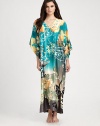 Vivid florals transform this comfortable design in smooth, easy-to-wear fabric. V-neckThree-quarter kimono sleevesAbout 52 from shoulder to hemPolyesterMachine washImported