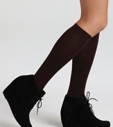 Basic knee socks with elastic band for stay up power.