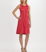 Stretch poplin gives this button-down sheath clean lines and a great fit.Collar neckSleevelessButton placketSide zipperAbout 41 from shoulder to hem67% cotton/28% polyester/5% elastaneDry cleanImported Model shown is 5'10½ (179cm) wearing US size 4. 