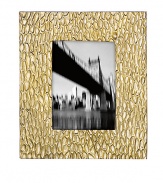 It's metal artistry with a New York edge - display your favorite memories in this hand-cast aluminum frame for a distinctive touch to any home display.HandmadeAluminum alloyImported