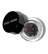 Our award-winning, long-lasting liner now in a pigment-rich color reminiscent of the desert night sky (the perfect shimmery shade for ultra-glam eyes). With the precision of liquid eyeliner and the flexible feel of a gel, this long-wearing, water-resistant formula goes from subtle to bold depending on how it's applied. Color glides on easily then lets you adjust your look before it dries, locking it in place for crease-free and smudge-proof wear from morning to night. To apply: Dip tip of Ultra Fine Eyeliner Brush (coat both sides of brush head). Wipe off excess before applying to eye. Work quickly as product becomes transfer-resistant once dry. To remove, use Instant Long-Wear Makeup Remover.