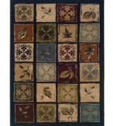 Distressed artwork is pieced together in an attractive, rich spectrum of fine colors upon this Yorkville area rug. Its low pile height and ultra soft hand offer a refined finish to any style decor. (Clearance)