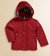 A quilted classic with detachable hood, check lining and zippered pockets in an A-line silhouette to help your mini-me brave the elements in style.Snap-off hoodShirt collarLong sleevesSnap-front with concealed zipperSide slash pockets with zippersNylonMachine washImported Please note: Number of snaps may vary depending on size ordered. 