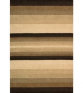 With a modern approach to traditional designs, the India House collection offers beauty to be appreciated for years to come. Meticulous hand-tufting results in truly artful detail. Tonal styling in rich browns and tans gives this rug striking geometric appeal.