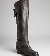 Over-the-knee boots go Western, hot on the trend with smokin' stacked heels and buckled harness details. Rope 'em in!