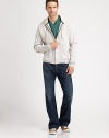 Relax in style in this classic bootcut in a medium wash, lightly distressed with their signature A-pocket stitching on the back pocket. Five-pocket styleInseam, about 3498% cotton/2% spandexMachine washImported