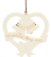 Anticipate a year when wedding and jingle bells will ring with this elegant ornament from Lenox. Sculpted ivory porcelain is dated and detailed in polished gold.