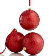 Prepare to be dazzled. Glittery red ball ornaments crafted of shatterproof glass guarantee a tree that's always merry and bright. From Kurt Adler.