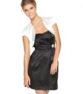 A perfect prom layering piece, this Roberta satin shrug adds a sophisticated flair to any dress!