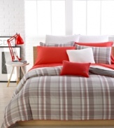 This Lacoste Luxembourg duvet cover set pairs soft-hued plaid patterns with vibrant pops of color, resulting in a polished, preppy finish. Piped edges add sporty style to the ensemble. Button closure.