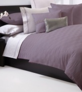 This Windsor Plum quilted sham from Hugo Boss turns your bed into an oasis of tranquility. 350-thread count cotton sateen and silk textures provide endless comfort. Zipper closure.