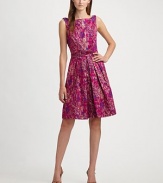 Brightly-hued shimmery brocade, elevated by exposed pleated edges at the waist.Sabrina neckline Sleeveless Full pleated skirt Side slash pockets Concealed back zip Fully lined About 22 from natural waist 62% acetate/32% nylon/6% polyester Dry clean ImportedModel is 5'10 (177cm) wearing US size 4. 