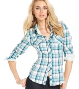 Inspired by the boys, but this GUESS? shirt is tailored just for you. A bright plaid print and pearlized snap-button closures make this a stylish statement for any day of the week.