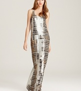 Gilded in sparkling sequins, this glamorous BCBGMAXAZRIA maxi dress touts side pockets for an unexpected casual edge.