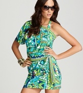 Dare to bare it with this cut out one piece from Trina Turk. Its bold, '60's-inspired print and revealing details define statement making, so wear this suit to make waves.