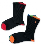 Add a little flair to your dress attire with these understated solid crew neck dress socks with contrast on heel, toe, and cuff by Polo Ralph Lauren.